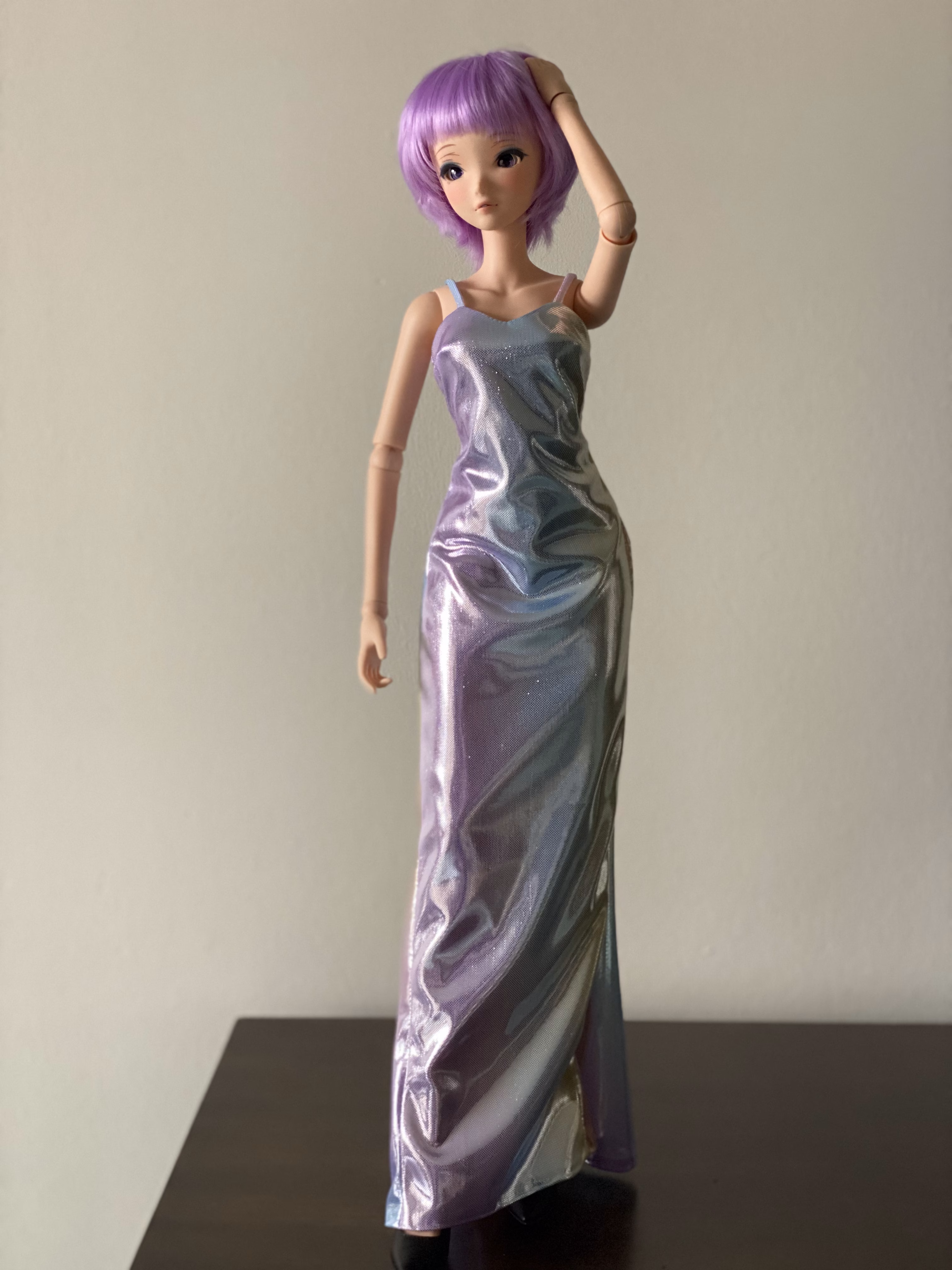 Smart Doll wearing a shiny dress
